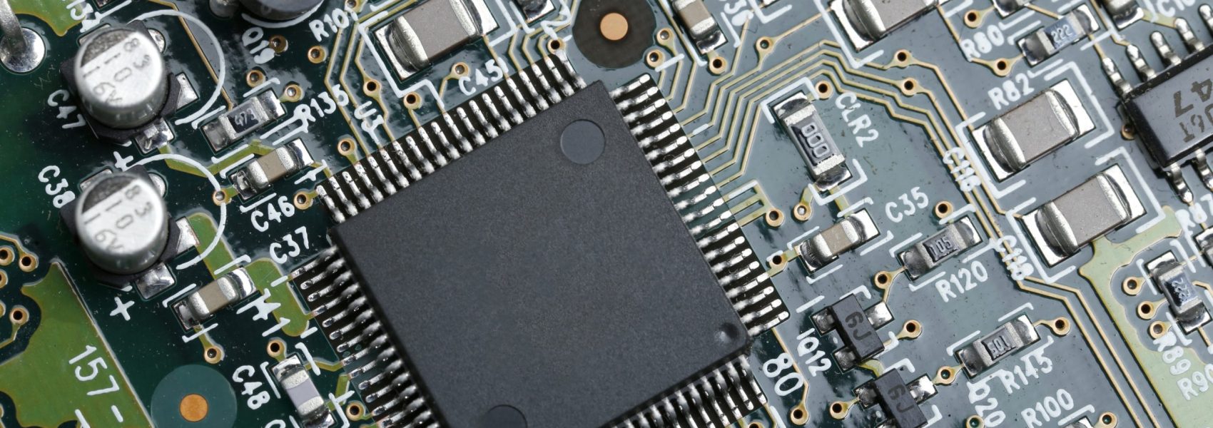 Closeup of electronic circuit board with CPU microchip electronic components background Closeup of electronic circuit board with CPU microchip electronic components background